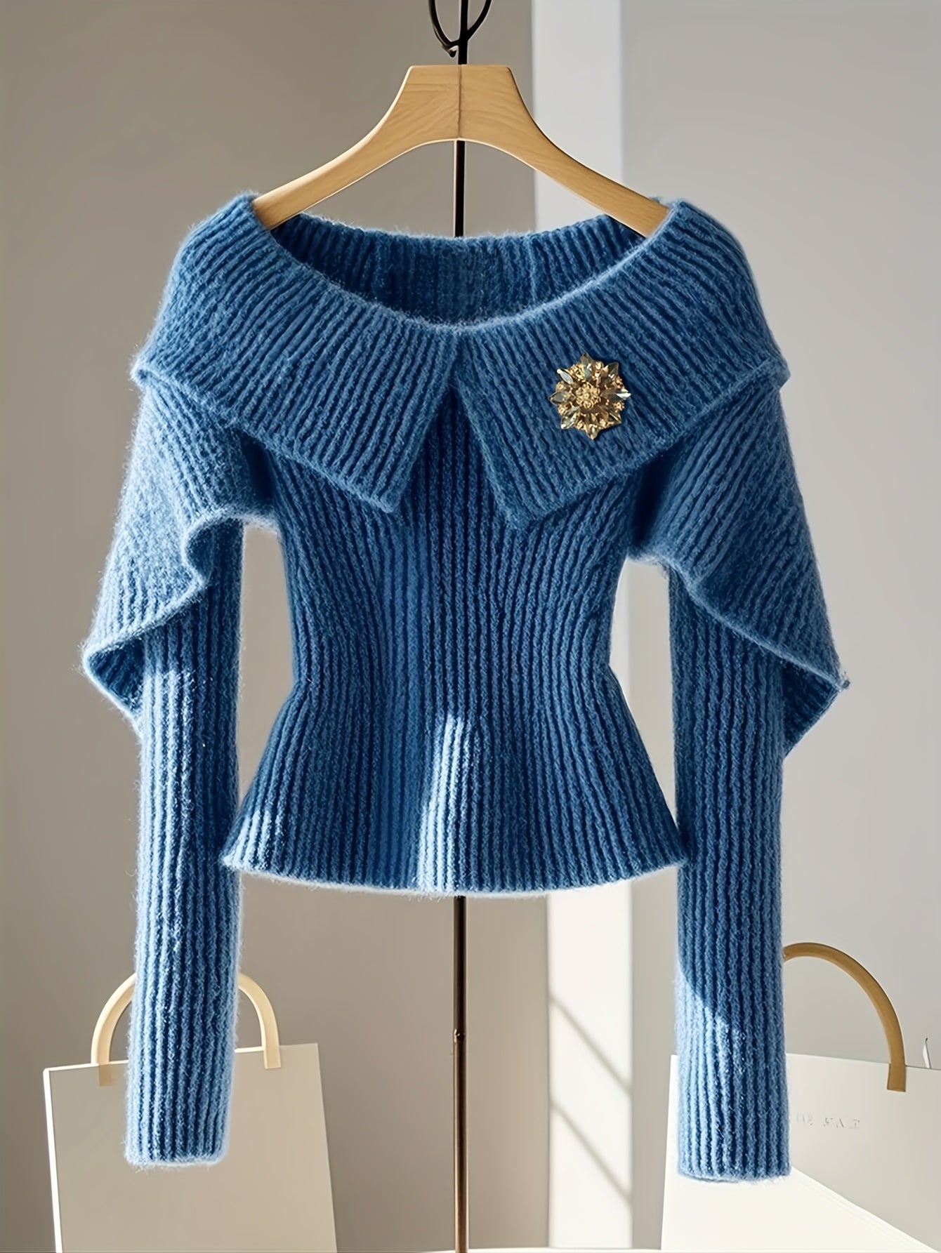 Blue Off-Shoulder Fitted Knit Top with Brooch