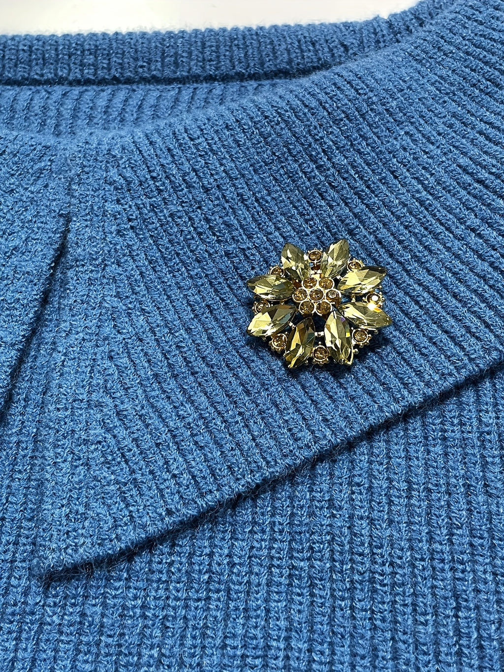 Blue Off-Shoulder Fitted Knit Top with Brooch