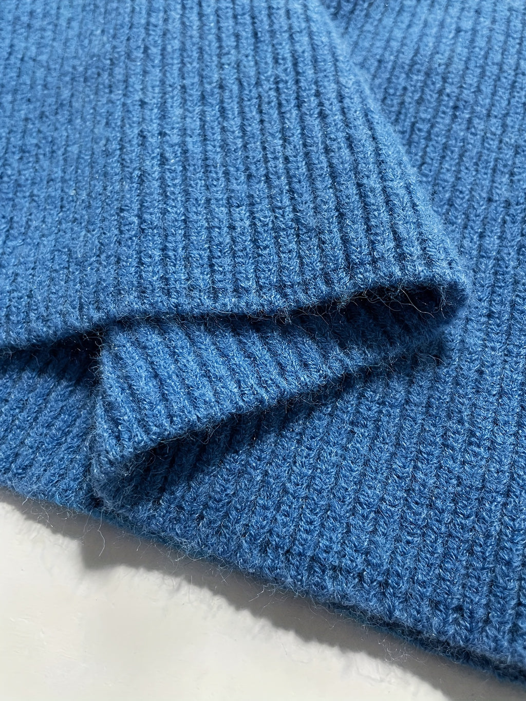 Blue Off-Shoulder Fitted Knit Top with Brooch